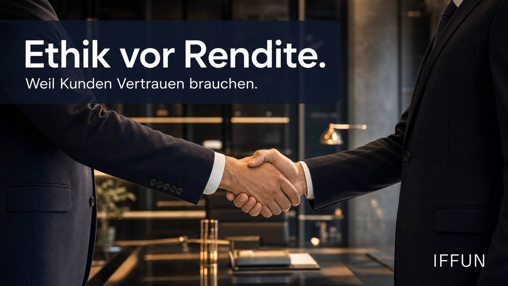 Zwei Geschäftsleute im Anzug beim Händedruck